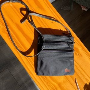 Dooney and Bourke triple zipper crossbody bag